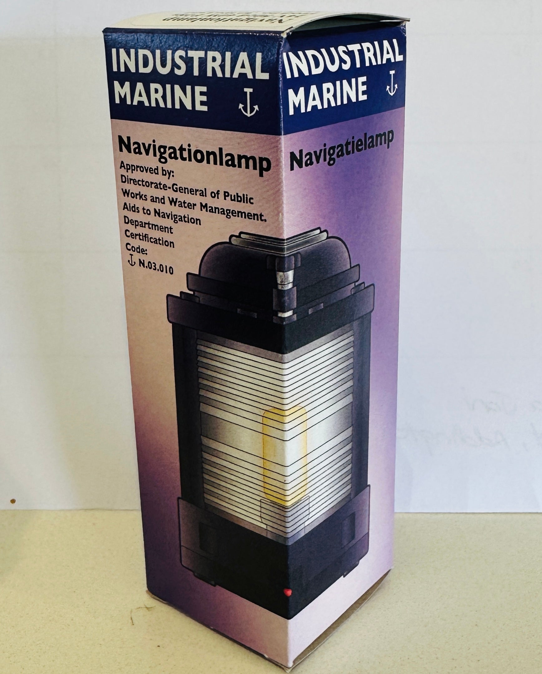 Box packaging of an Industrial Marine navigation lamp on a white background